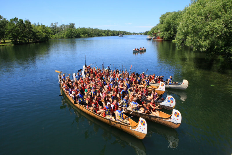 The Toronto Islands race course has seen thousands of canoe races through its long history.  Today, we race voyageur canoes there for team challenge corporate events.